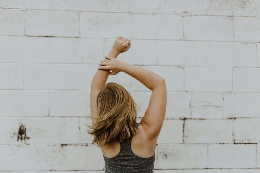 10-Minute No-Equipment Full-Body Workout - Person Stretching