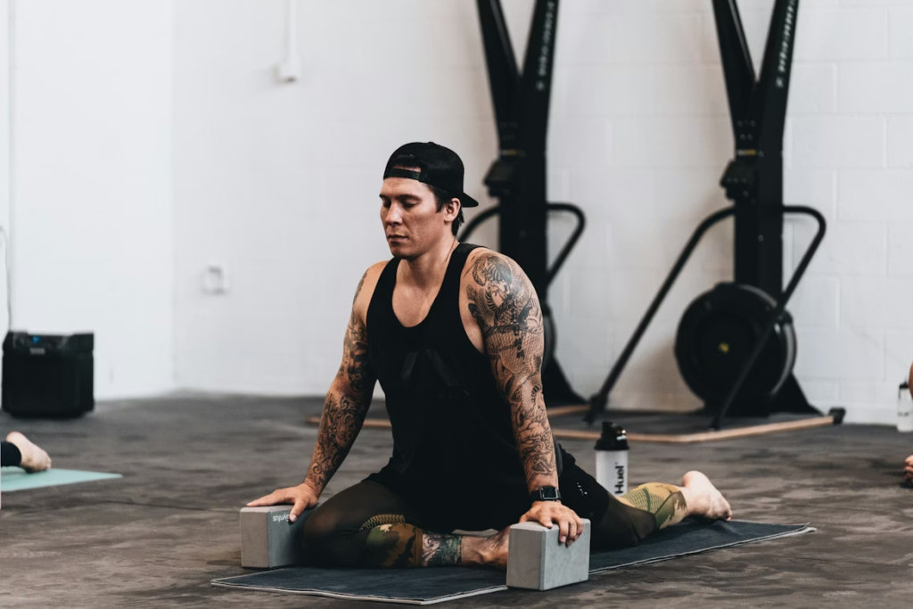How Many Rest Days Should I Have - Person Stretching