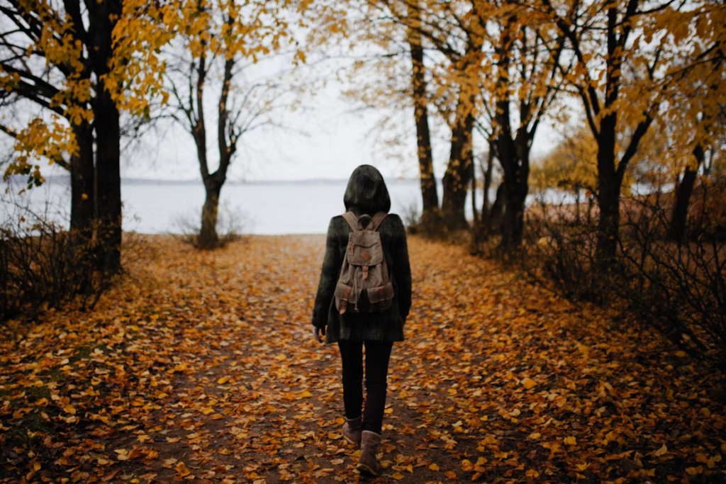 should I work out with sore muscles-Person walking